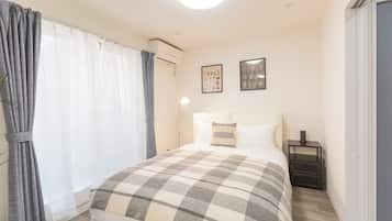 Habitació Deluxe, balcó, vistes a la ciutat | Cortines opaques i wifi gratuïta