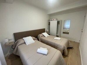 4 dormitorios, tabla de planchar con plancha, wifi y ropa de cama