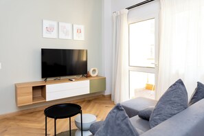 อพาร์ทเมนท์, 1 ห้องนอน, ระเบียง, วิวเมือง | บริเวณนั่งเล่น
