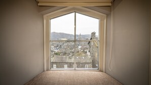 A room with a large bay window overlooking a town. - The Viewpoint -  Central Ambleside and short stroll to shops, cafes (Ambleside)