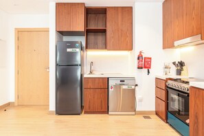 Exclusive Apartment, Balcony, Partial Sea View | Private kitchen | Full-size fridge, microwave, oven, stovetop