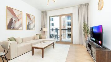 Exclusive Apartment, Balcony, Partial Sea View | Living room | Smart TV