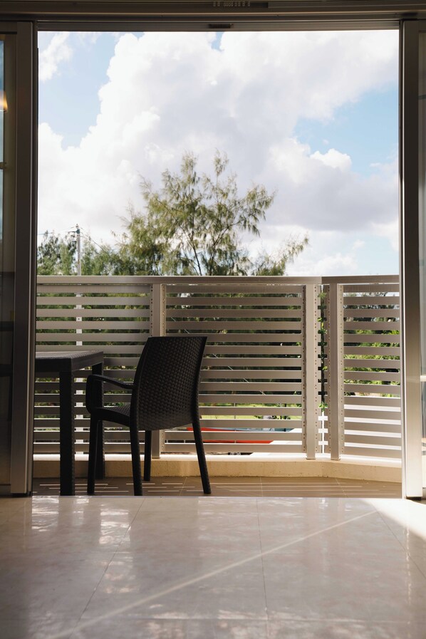 Family Room, Balcony, Bay View | Terrace/patio