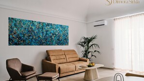 A living room with a brown sofa, a brown armchair, a coffee table, and a large abstract painting. - Sicilian Luxury for Families, 3 Minutes from the Sea and the UNESCO Cathedral. (Cefalù)