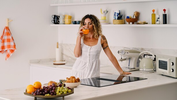 A modern kitchen with a countertop, a kettle, and a bowl of fruit. - Sicilian Luxury for Families, 3 Minutes from the Sea and the UNESCO Cathedral. (Cefalù)