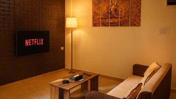 Family Apartment, Balcony, Garden View | Living area