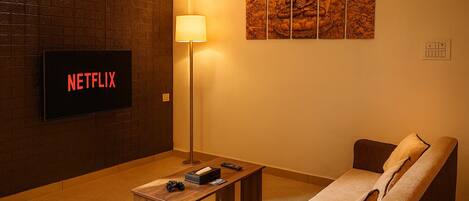 Family Apartment, Balcony, Garden View | Living area