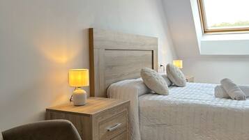 2 dormitorios, tabla de planchar con plancha, wifi y ropa de cama