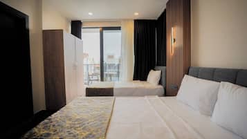 Comfort Room, Balcony, Pool View | In-room safe, free WiFi