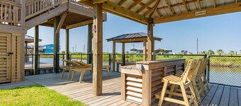 Canal front cutie with Boat lift, Bay access, and Ocean view!