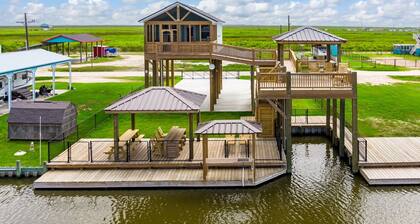 Canal front cutie with Boat lift, Bay access, and Ocean view!