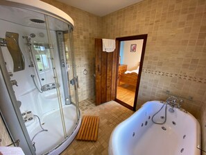 Shower, hair dryer, towels, soap