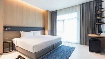Desk, laptop workspace, free WiFi, bed sheets