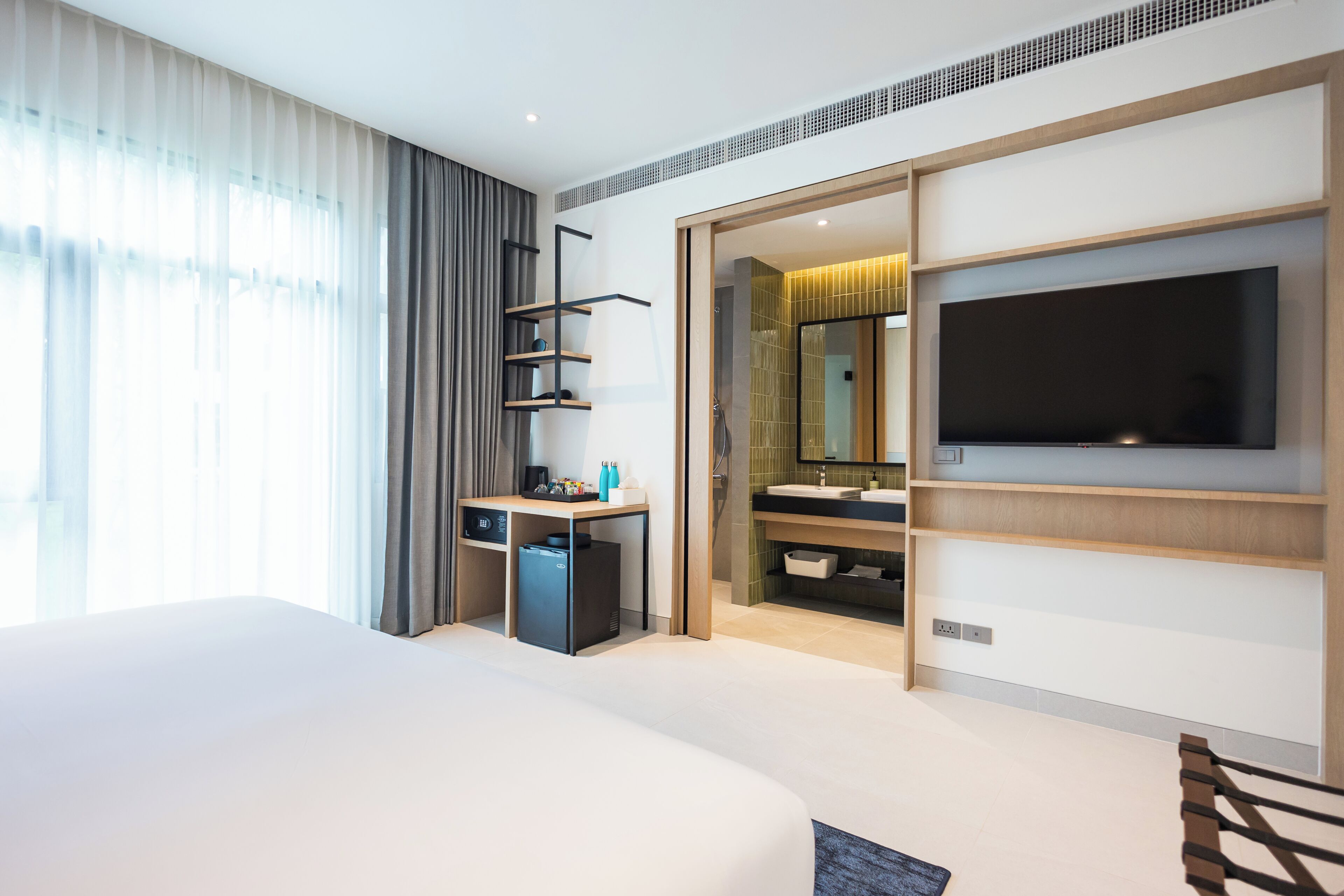 ห้องดีลักซ์ดับเบิล, วิวสวน | โต๊ะทำงาน, พื้นที่ทำงานแบบใช้แล็ปท็อป, Wi-Fi ฟรี, ผ้าปูที่นอน