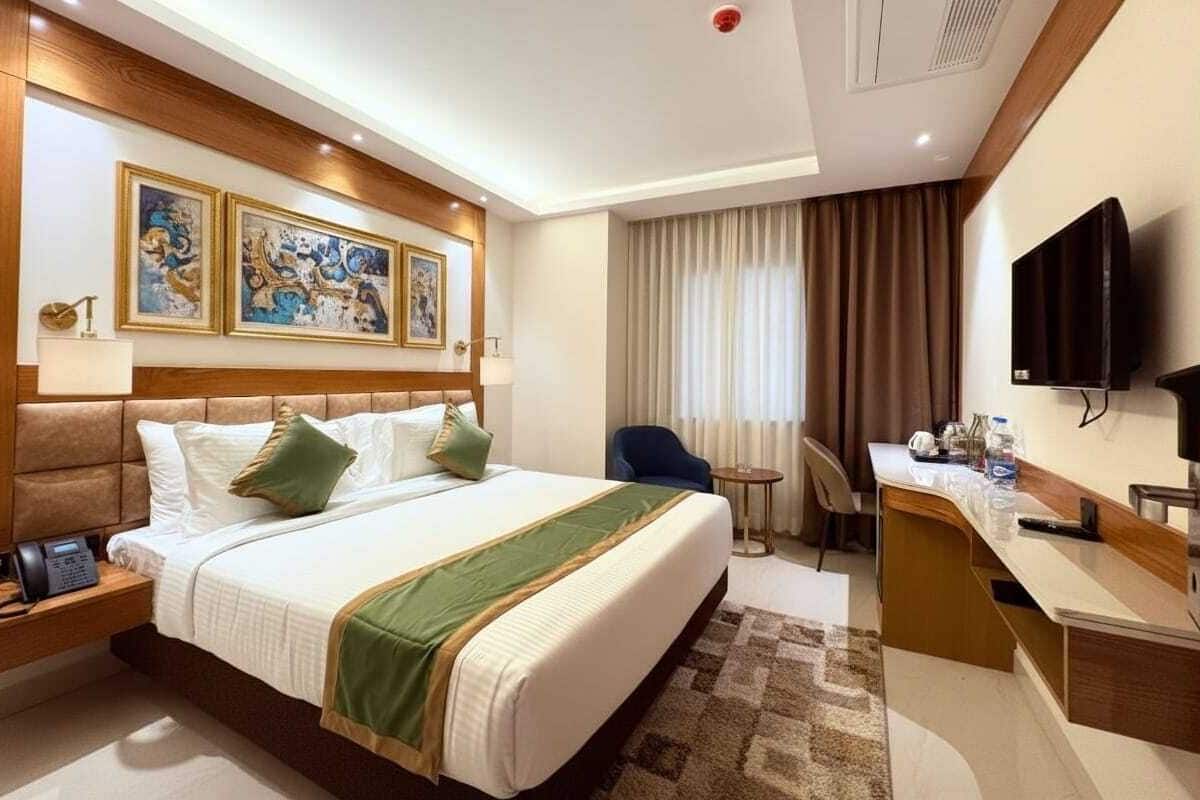 Chambre Deluxe double | Literie de qualité, coffre-fort, bureau