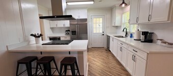 Welcome to South of Town in Brandon, MS — a cozy 3BR, 2BA fully furnished home.