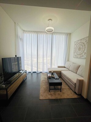 TV - Luxury Apartment w/ Burj Khalifa & Lagoon Views (Dubai)