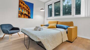 2 habitaciones, tabla de planchar con plancha y acceso a internet