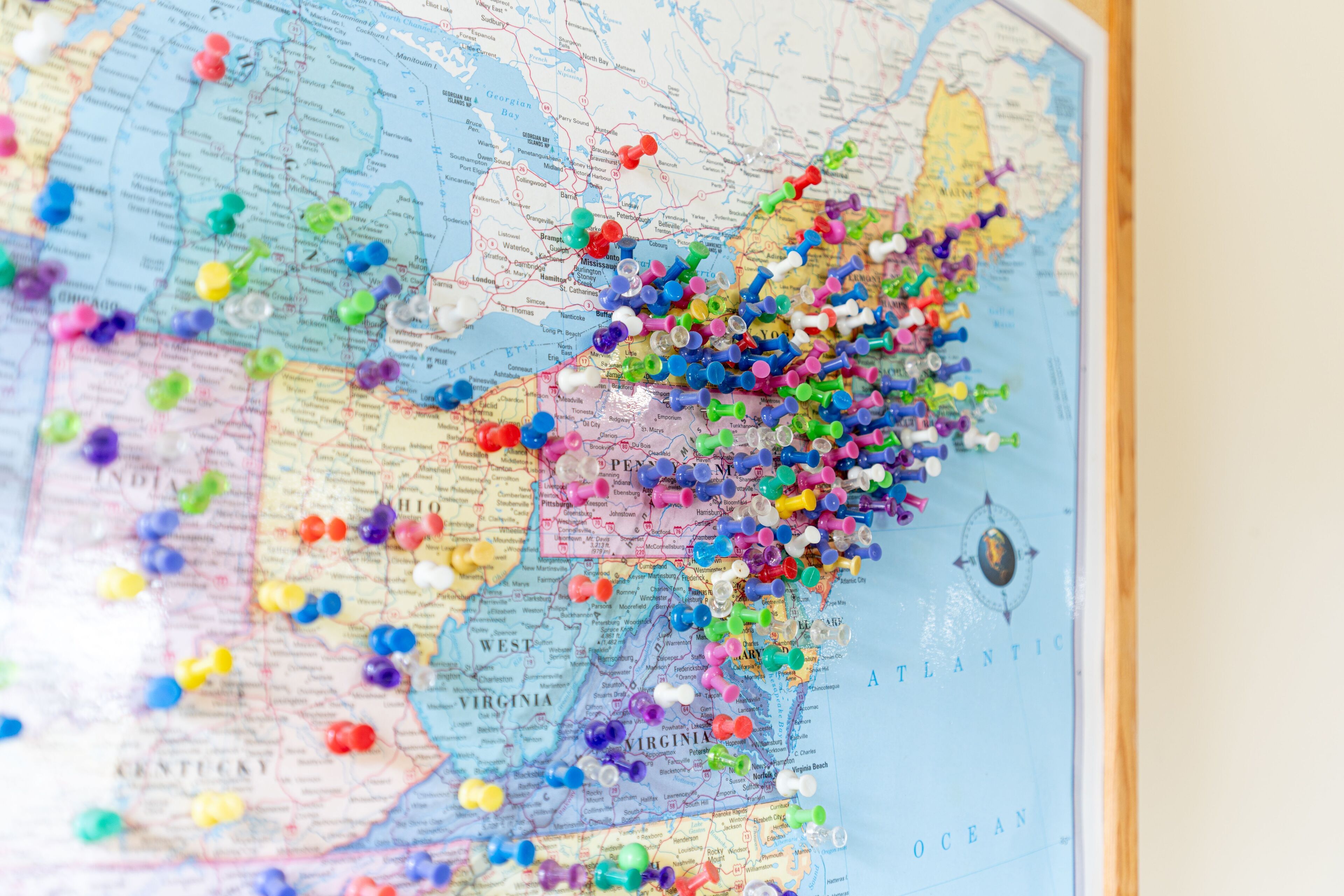 A map with various colored pins marking locations.