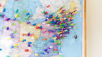 A map with various colored pins marking locations.