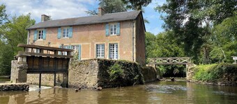 Mill on the banks of the Indre in Berry. A bucolic, historic site on an island