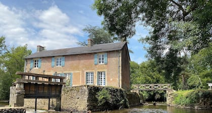Mill on the banks of the Indre in Berry. A bucolic, historic site on an island