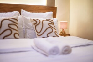 2 عدّة غرف نوم ومكواة/لوح كي وواي فاي مجانًا وملاءات أسرّة