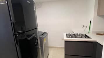 Een kookplaat, een vaatwasser