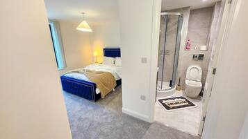 Desk, laptop workspace, blackout drapes, soundproofing