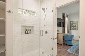 Shower, hair dryer, towels, soap