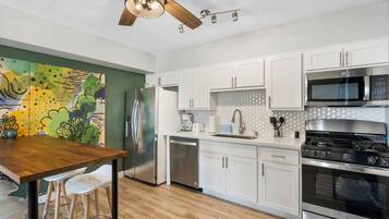 Apartment | Private kitchen | Full-size fridge, microwave, oven, stovetop
