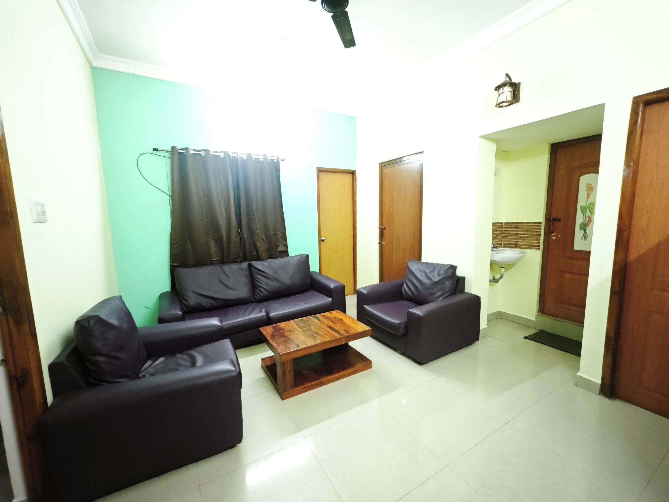 Luxury Apartment, Balcony, City View | Living area | 32-inch plasma TV with satellite channels, printers