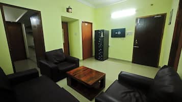 Luxury Apartment, Balcony, City View | Living area | 32-inch plasma TV with satellite channels, printers