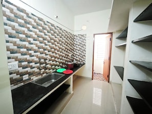 Luxury Apartment, Balcony, City View | Private kitchen | Fridge, microwave