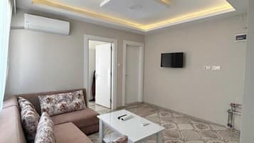 Comfort Apartment, City View | Desk, laptop workspace, blackout drapes, free WiFi