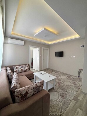 Comfort Apartment, City View | Desk, laptop workspace, blackout curtains, free WiFi