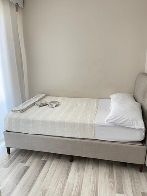 Desk, laptop workspace, blackout curtains, free WiFi