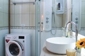 Hair dryer, towels, soap, toilet paper