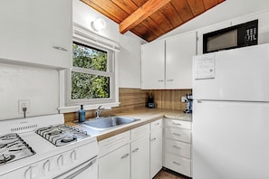 Fridge, microwave, coffee/tea maker, toaster