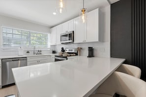 Oven, stovetop, dishwasher, coffee/tea maker
