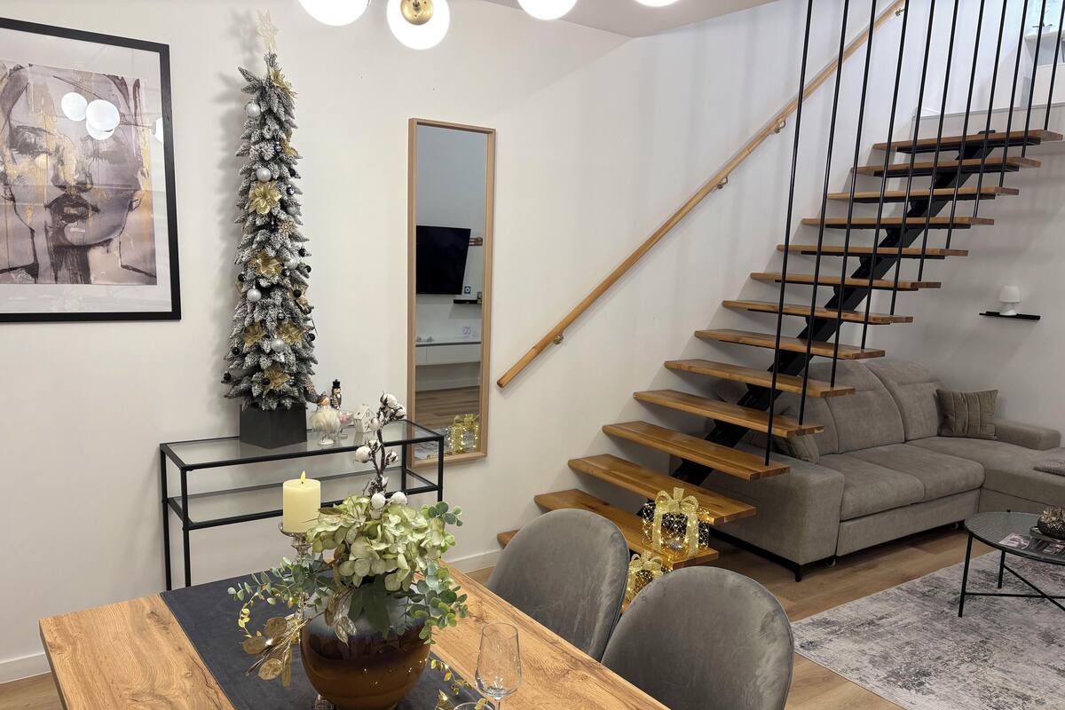 Appartement Supérieur, vue ville | Coin séjour | Livres