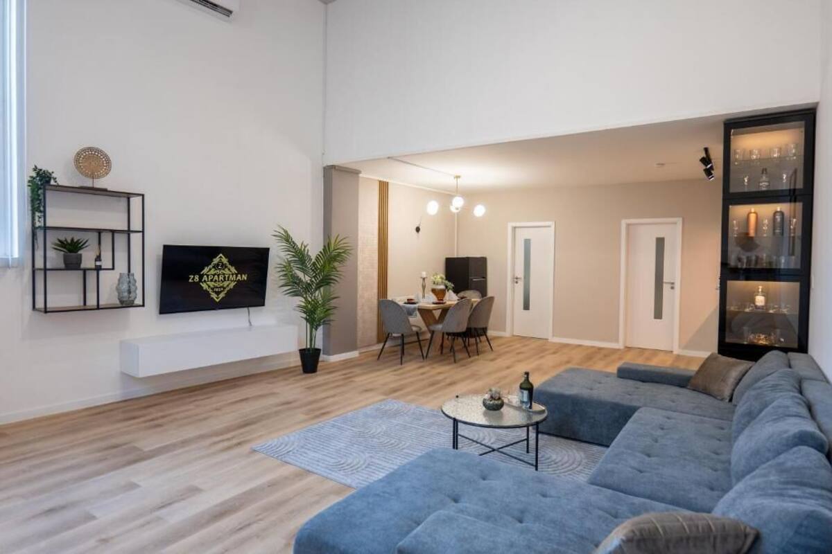 Appartement Deluxe, vue ville | Coin séjour | Livres