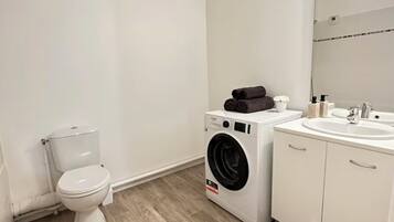 Hair dryer, towels, soap, toilet paper