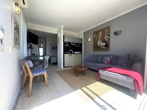 Deluxe Apartment, Balcony, Ocean View | Living area