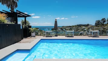 Outdoor pool, pool umbrellas, pool loungers