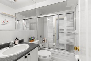 Shower, hair dryer, towels, soap