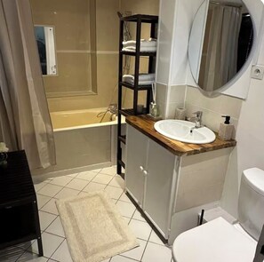 Hair dryer, towels, soap, toilet paper