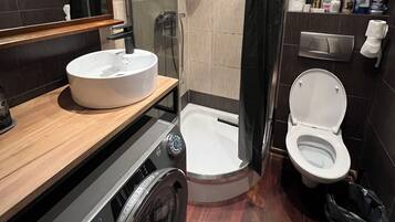 Hair dryer, towels, soap, toilet paper