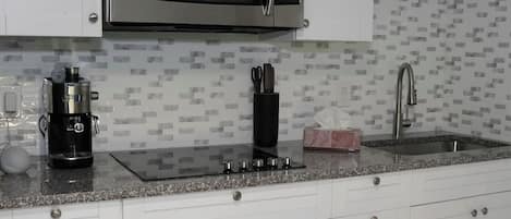 Microwave, stovetop, coffee/tea maker, toaster