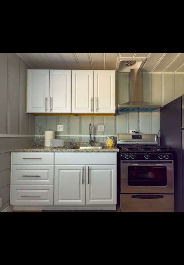 Een magnetron, een oven, een kookplaat